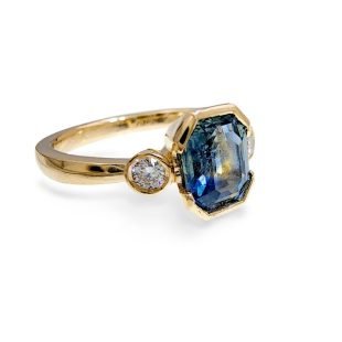 14K yellow gold ring enhanced with natural montana sapphire.